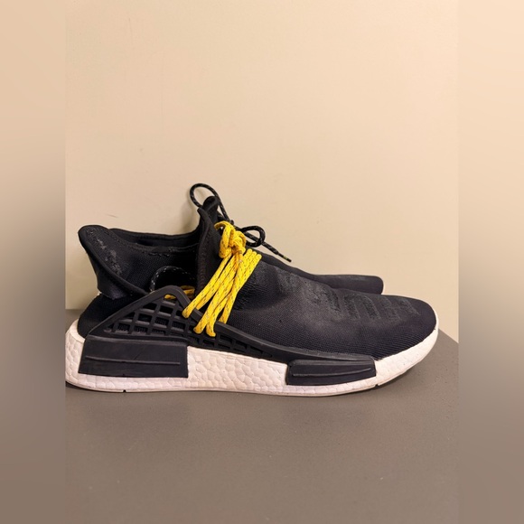 black and yellow nmd human race